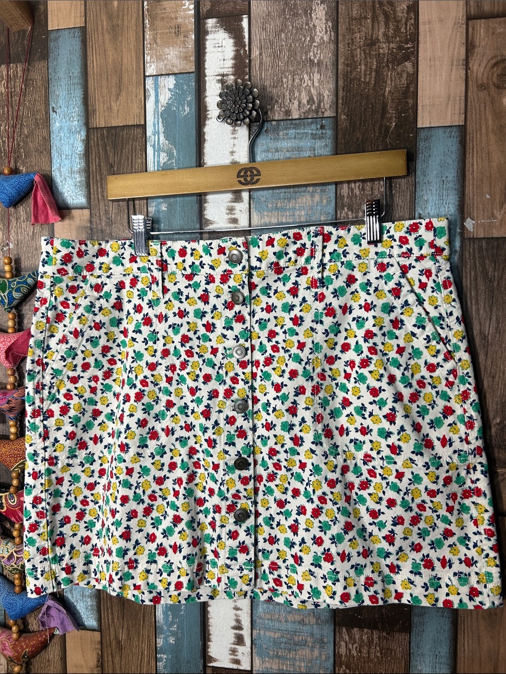 Button-Front Floral Mini Skirt in White with Red, Yellow & Green